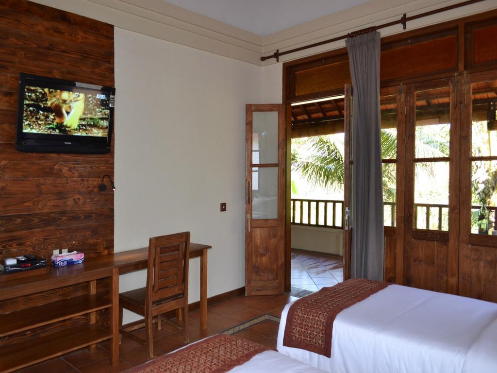 Omah Apik Hotell Ubud Rum bild